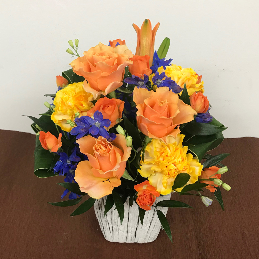 青とオレンジのアレンジメントSサイズ（H35）